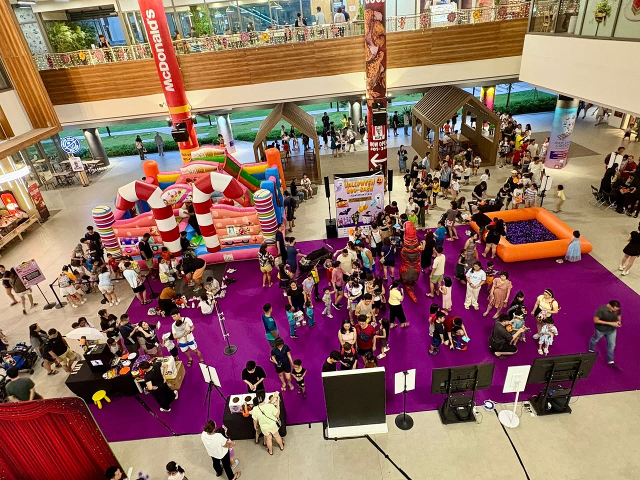 Excited attendees enjoying the Halloween Boo-Bash at Plantation Plaza.