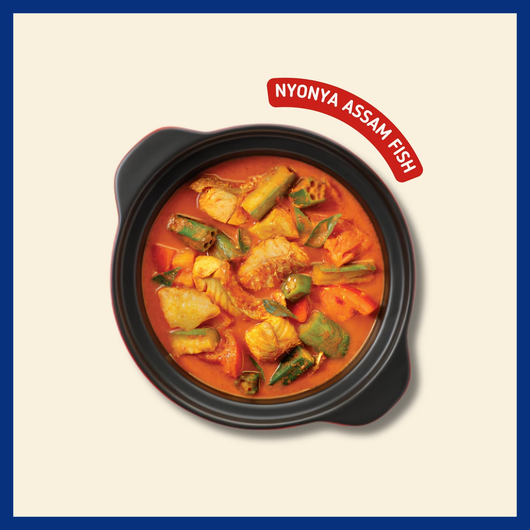 Nyonya Assam Fish served in black ceramic bowl