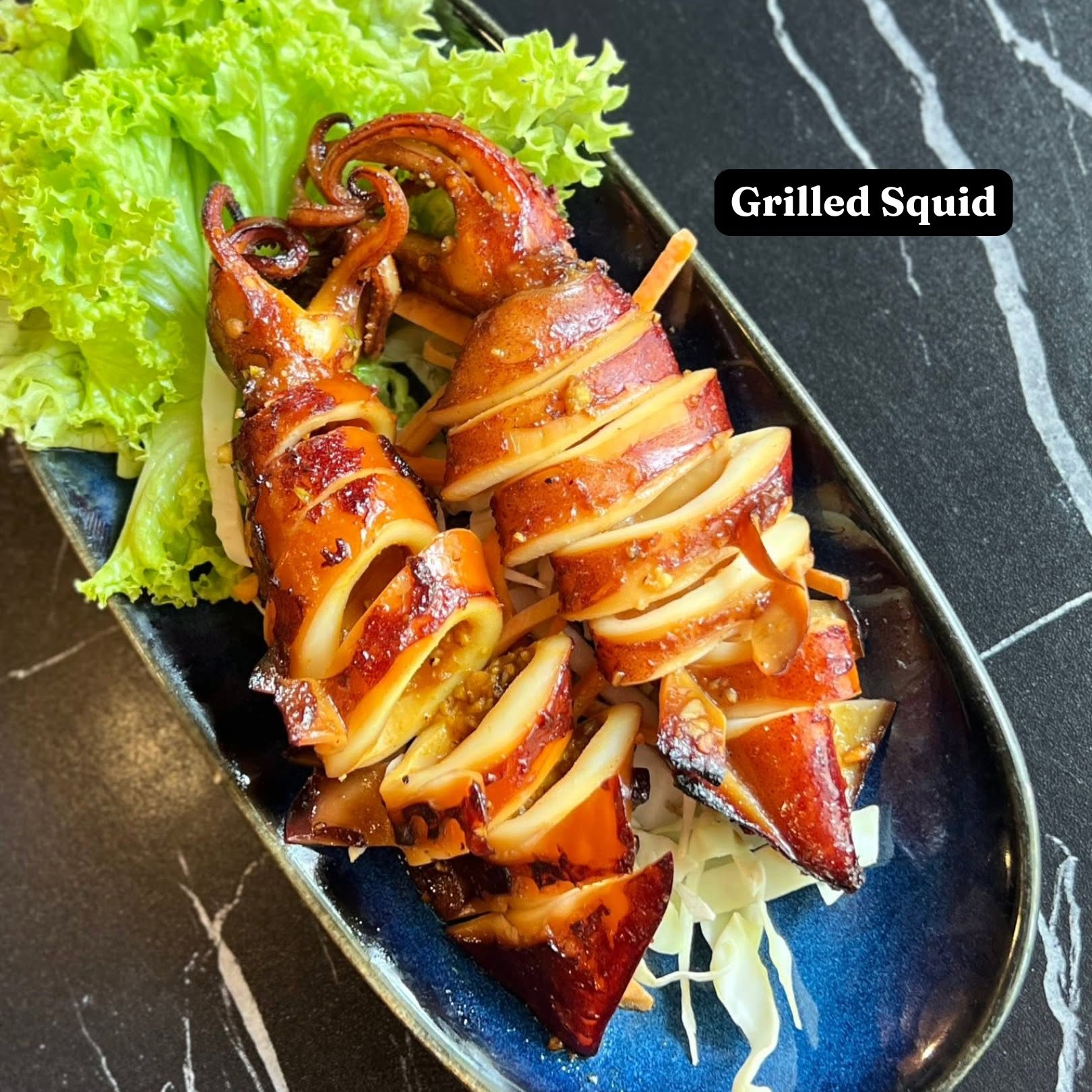 Grilled squid at I Love Sukhothai priced at $18.50